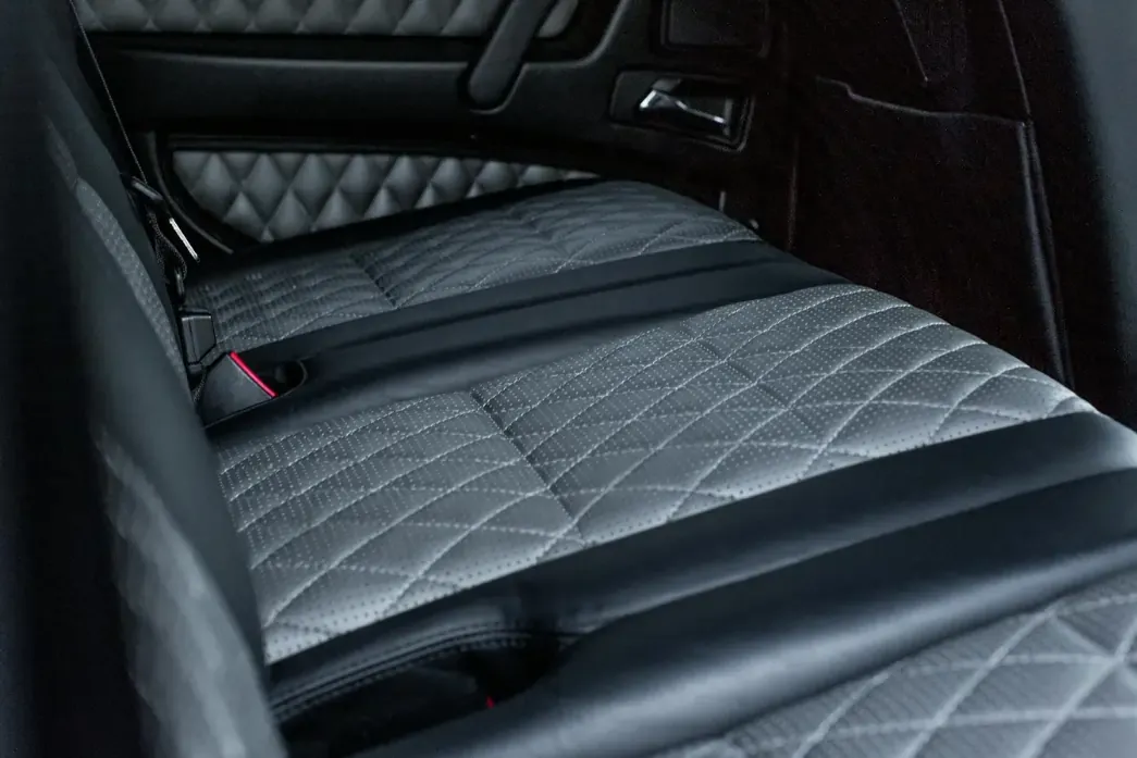 Close crop of a quilted leather seat